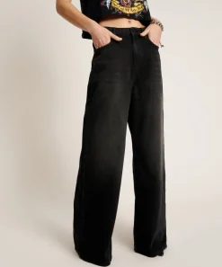 Online - Love Machines Mid Waist Super Wide Leg Jeans - Washed Black Flare | High-Rise